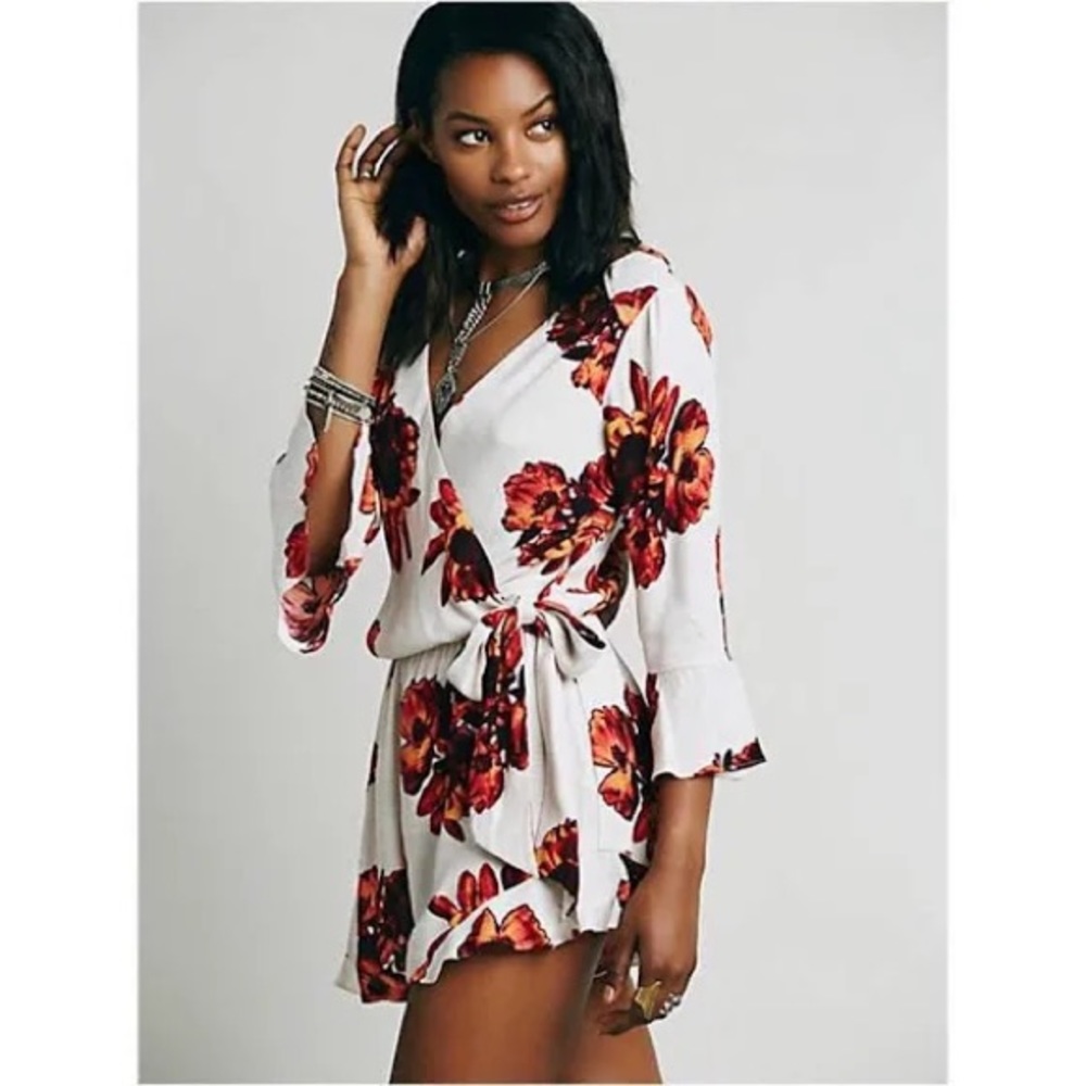 Free People All The Right Ruffles White Orange Floral V Neck LS Romper